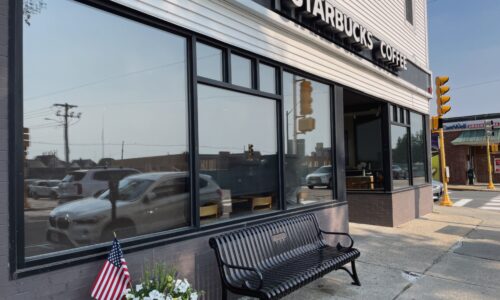 Celebration Bench for Needham Cyclist Parks Outside Starbucks