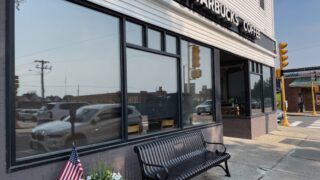 Celebration Bench for Needham Cyclist Parks Outside Starbucks